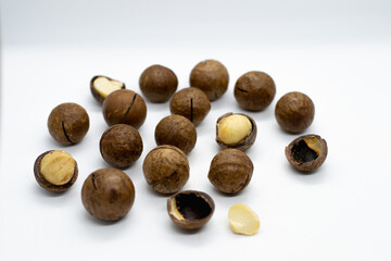 Macadamia on white background. Huts. Healthy food