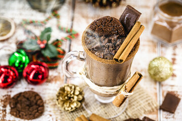 cup of hot chocolate garnished with whipped cream, marshmallow and cocoa powder. Winter and autumn. Christmas drink