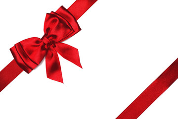 Red satin bow and ribbon isolated on white background