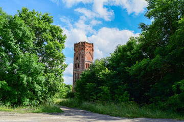 Fototapeta na wymiar Summer photo of the old brick tower