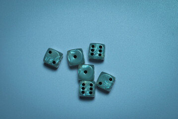 six dice indicate random numbers on a light background