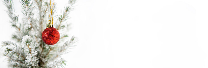 Christmas tree decoration. Merry Christmas horizontal banner. Small tree isolated on white background.