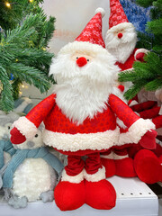 santa claus and christmas tree in the market