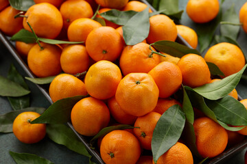 Fresh mandarin orange fruits with leaves