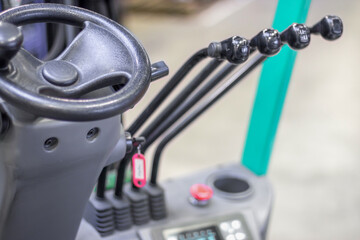 loader steering with control levers.