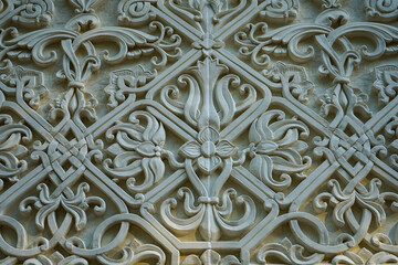 vintage plaster pattern on a fragment of a stone wall