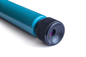 Black plastic eyepiece of a blue spyglass