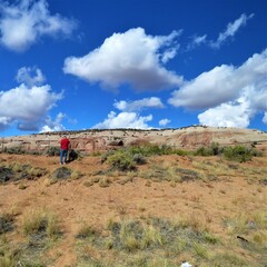 Fototapeta na wymiar Hiking up the mountain at Moab Park in Utah, USA