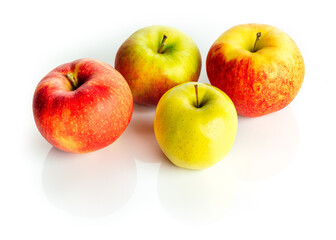 Bio healthy apples, isolated on white background with reflections. Tasty fruit for breakfast. Vitamins in the eco fruits. Organic apples from eco farm isolated on white background. close up. 