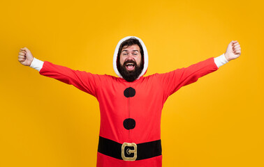 bearded santa man in hat smiling while prepare for celebrating happy new year party and christmas holiday in winter going to have xmas presents, joy