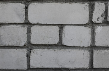 A detailed view of white brick wal