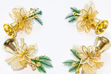 Christmas tree decorations in Golden color on a white background. The new year holiday. Festive new year decoration. Christmas background texture