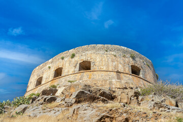 Ruins of the venetian fortress on the island of Spinalonga, Gulf of Elounda, Lasithi, Crete, Greece. It was used as a leper colony from 1903 to 1957