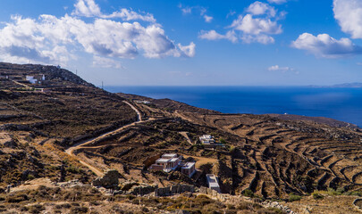 Fototapeta na wymiar Houses and coastal landscapes near Kardiani on the island of Tinos, Cyclades, Greece