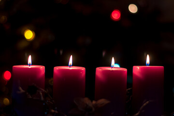 Advent candles concept with burning candles