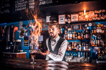 Barman mixes a cocktail in the brasserie