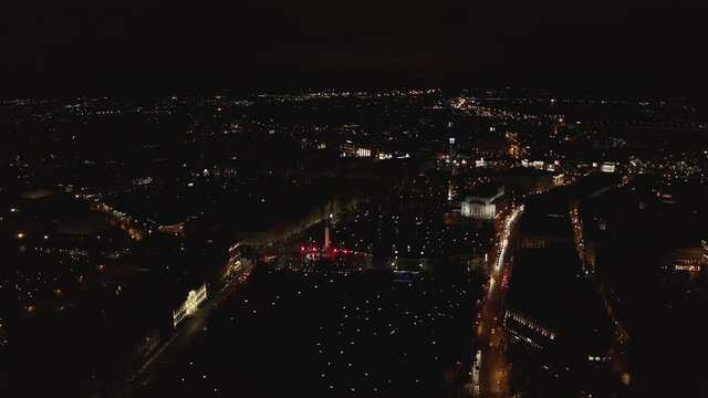 Flying over Riga at night during Staro Riga event. Beautiful illumination of Riga, Latvia.