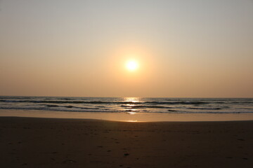 Fototapeta na wymiar sunset on the Arabian sea on the beach India