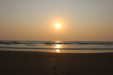 sunset on the Arabian sea on the beach India