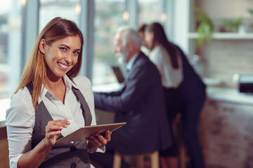 Business woman hold white blank paper. Young smiling.