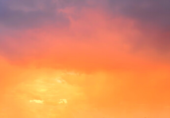 Atmospheric sunset in stormy pink sky. Bright Multicoloured Background.