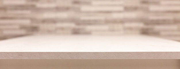 Banner background with a white table and grey rectangular pattern on background with selective focus