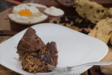 Christmas panettone on rustic table. some table decorations
