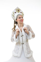 Beautiful, happy woman with long hair, dressed as Santa Claus smiling. Christmas - New Year carnival.