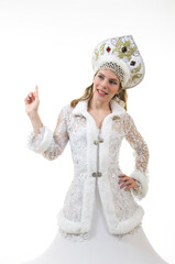 Beautiful, happy woman with long hair, dressed as Santa Claus smiling. Christmas - New Year carnival.