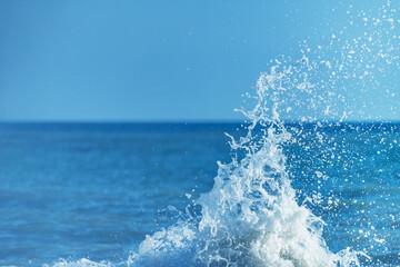 Wave of the sea water at sunny day time.