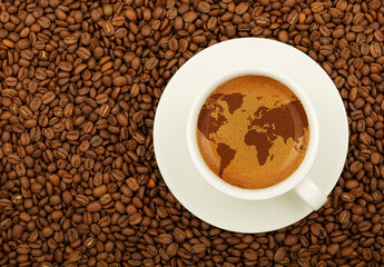 Espresso cup with world map on coffee froth crema