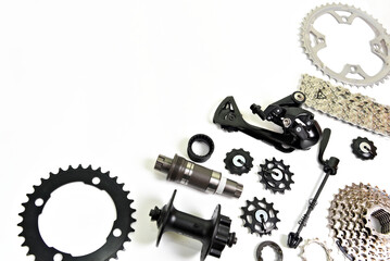 Bicycle drive parts on a white background. - obrazy, fototapety, plakaty