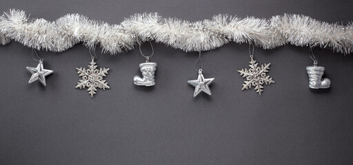 christmas banner, silver christmas decorations on black background, happy new year background, layout on black, free space, blank for design