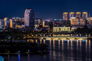 Fototapeta na wymiar Night view of Changchun City and Nanhu Park in China