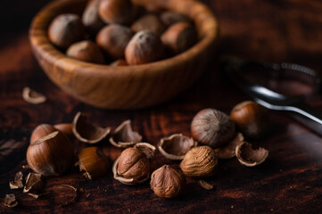 cracking hazelnuts shell with nuts cracker