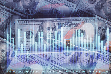 Fototapeta premium Multi exposure of forex chart drawing over us dollars bill background. Concept of financial success markets.