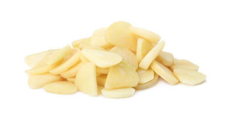 Pile of fresh sliced garlic cloves isolated on white. Organic food