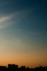 The evening sun sets over the horizon