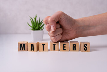 matters - words from wooden blocks with letters, Your feedback is important concept, top view
