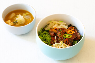 Korean food, Kkomag Bibimbab which is mixed with rice, vegetables and blood cockle
