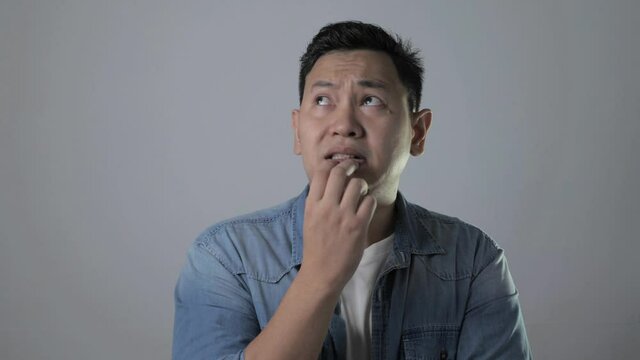 Young Man Nervous Afraid or Worried of Something