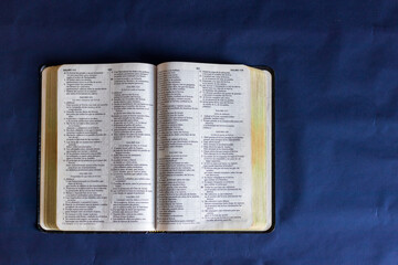 Holy bible book on a blue background