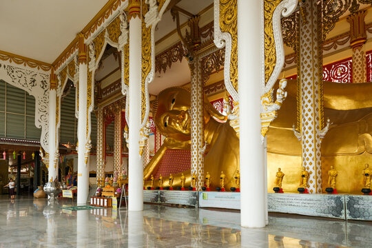 NONTHABURI THAILAND - OCTOBER 3, 2020 : "Wat Rat Prakhong Tham " the largest reclining Buddha in Nonthaburi province,Pagoda replica Significant third place, Destination introduction of NONTHABURI.