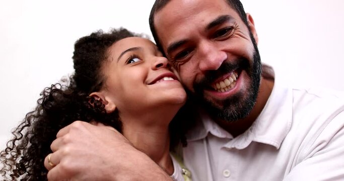 Father and daughter smiling at camera. real casual people. Child and dad
