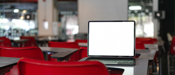 Close up view of laptop on lecture chair in modern classroom