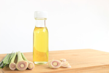 Lemongrass, plants, vegetables and herbs of Thailand on wood against a white background.