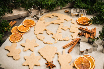 Making gingerbread cookies before Christmas. Christmas traditions. Christmas decorations.
