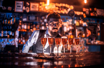 Barman makes a cocktail in the brasserie