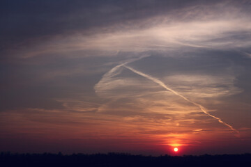 Panoramic view of clouds at sunset in the sky.