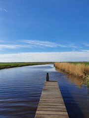 wooden bridge over the river